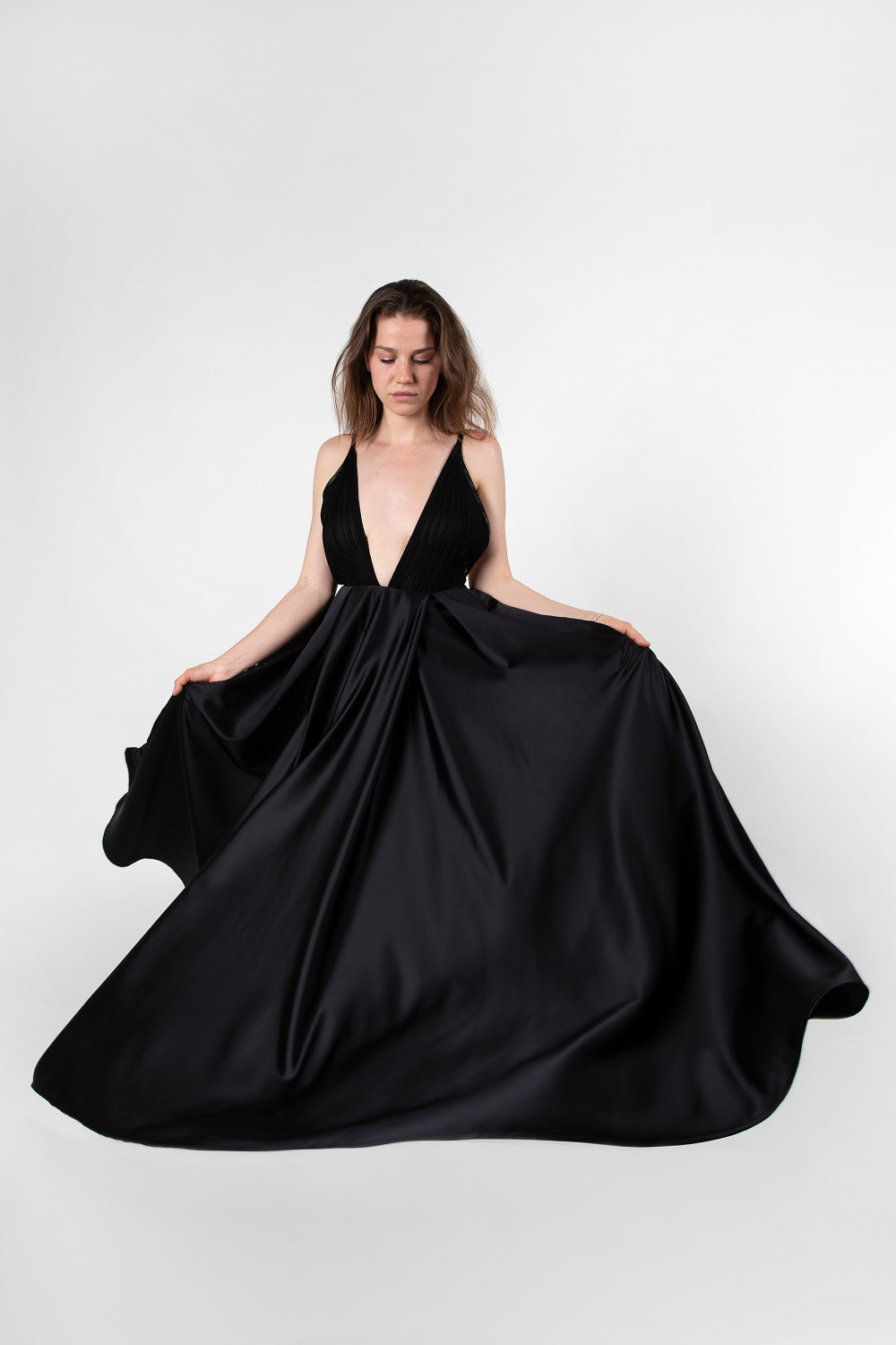 Černé šaty s plisé